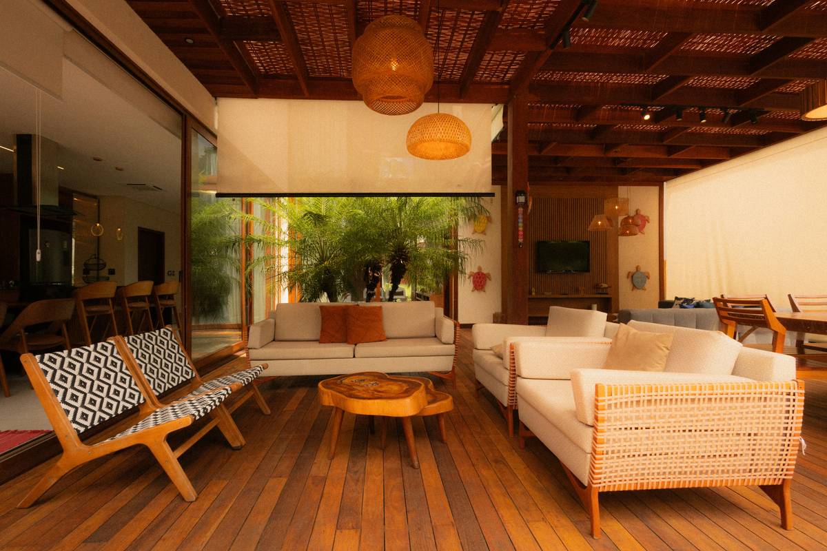 minimalist japanese style furniture in a sunlit living room with tatami mat, low wooden table, and shoji screen